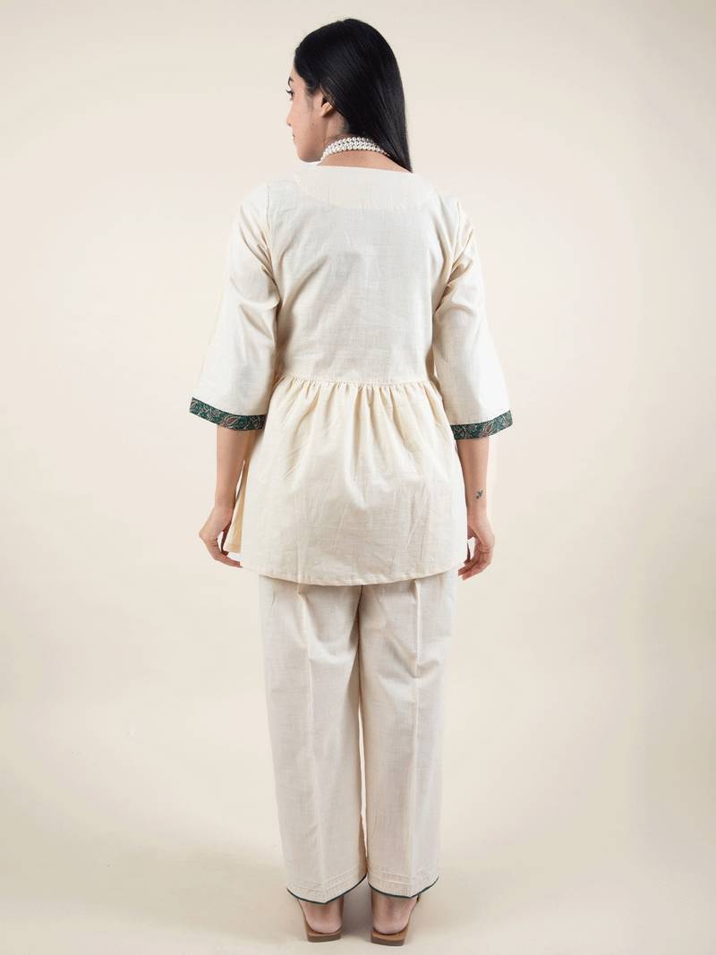 Yellow cotton peplum top with yellow paired with matching pant