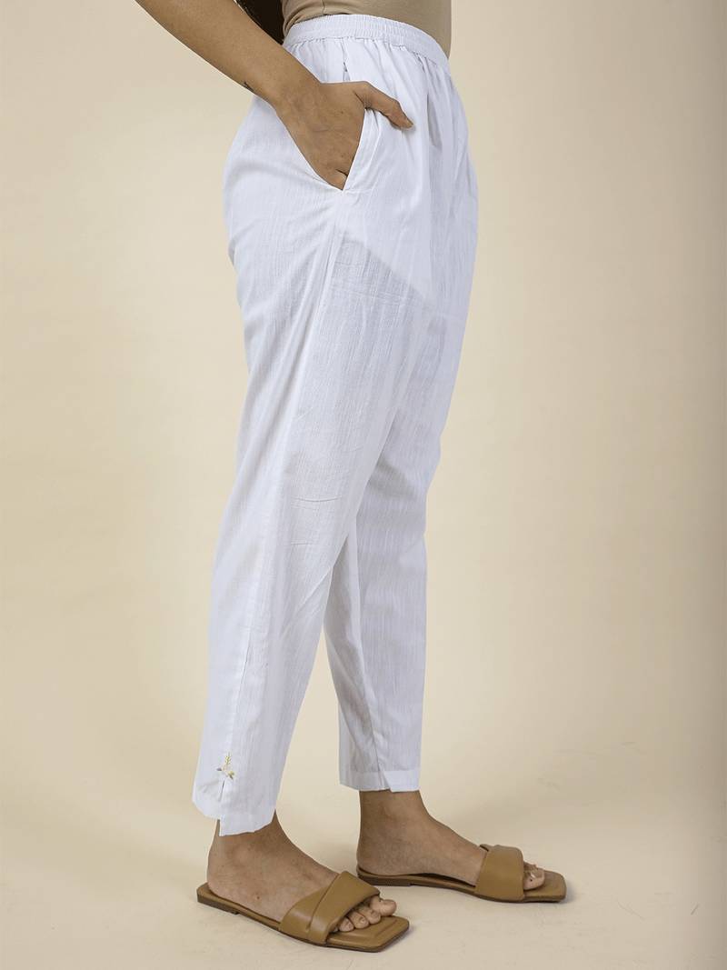 White colorful embroidered kaftan paired with matching pant