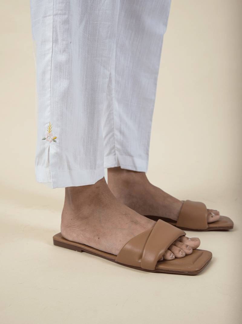 White colorful embroidered kaftan paired with matching pant