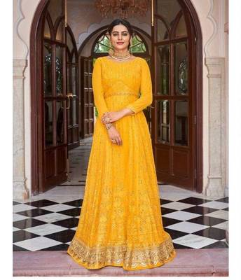 Yellow heavyfront & back embroidery georgette floor length full stitch gowns 1