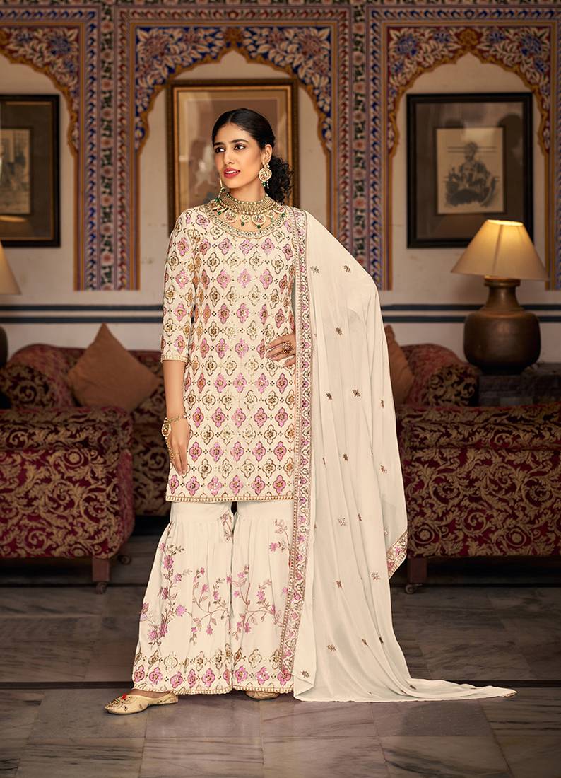 Cream color faux georgette embroidered semi stitched sharara suit
