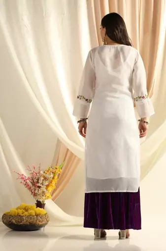 Shades chikankari kota kurti with purple and green work