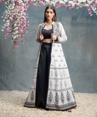 Ivory and black jacket  set. 2