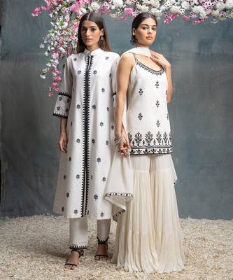 Ivory and black kurta pant set. 5