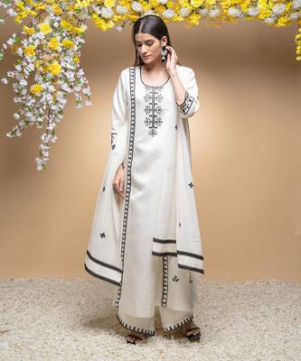 Ivory and black classic kurta set . 1