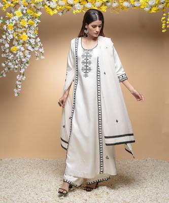 Ivory and black classic kurta set . 2