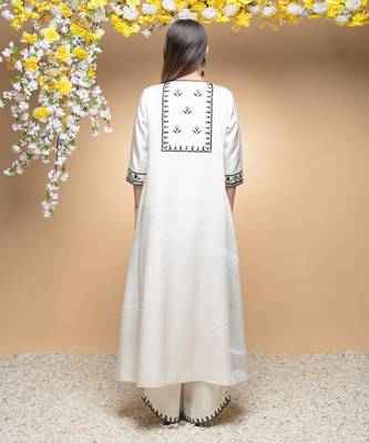 Ivory and black classic kurta set . 3