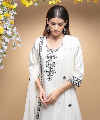 Ivory and black classic kurta set . 4