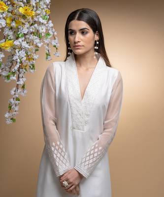 Ivory applique embroidered kurta set. 3