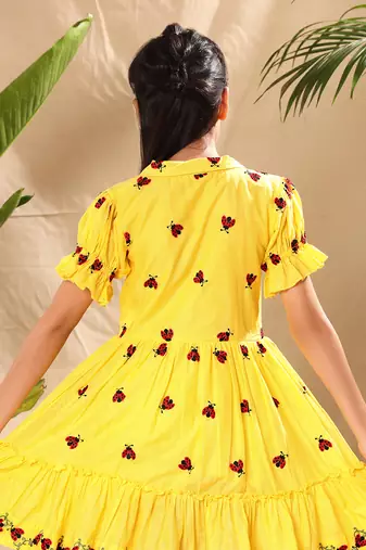 Yellow embroidered fit and flare dress with elasticated puff sleeve