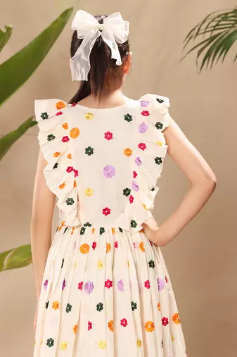 Off white embroidered flutter sleeve fit and flare dress