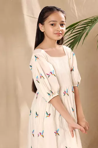 Off white embroidered empire line dress