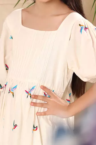 Off white embroidered empire line dress