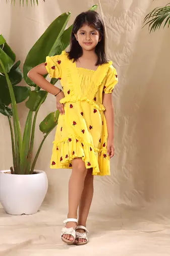 Yellow embroidered fit and flared tier dress with puff sleeves