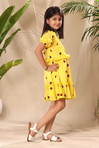 Yellow embroidered fit and flared tier dress with puff sleeves