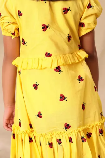 Yellow embroidered fit and flared tier dress with puff sleeves