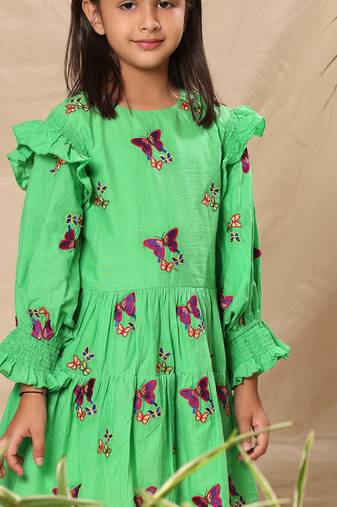 Green embroidered two tiered dress with smocked sleeves