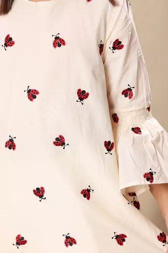 Off white embroidered tunic top and bottom co-ord set