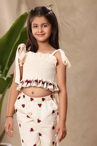 Off white embroidered smocked top and pant co-ord set