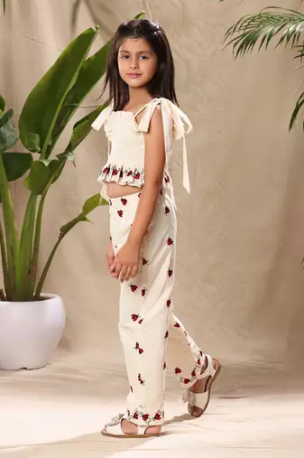 Off white embroidered smocked top and pant co-ord set