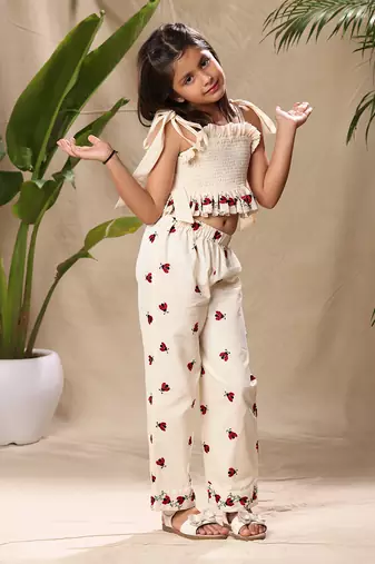 Off white embroidered smocked top and pant co-ord set
