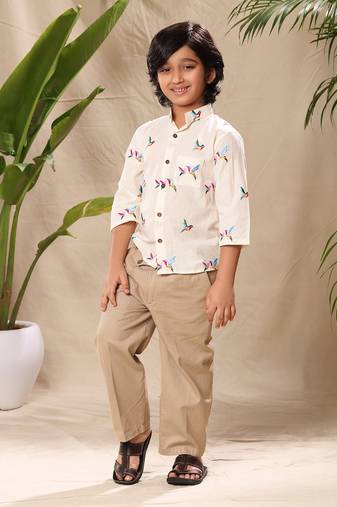 Off  white embroidered mandarin collar shirt with beige trousers