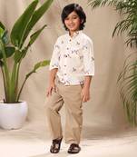 Off  white embroidered mandarin collar shirt with beige trousers