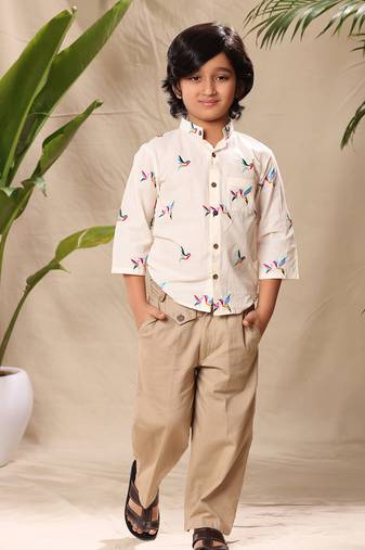 Off  white embroidered mandarin collar shirt with beige trousers