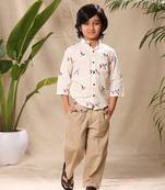 Off  white embroidered mandarin collar shirt with beige trousers