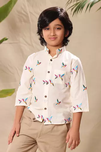 Off  white embroidered mandarin collar shirt with beige trousers