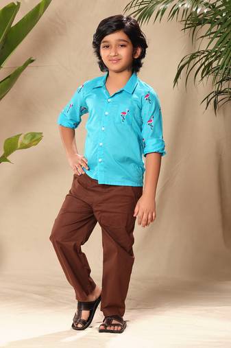 Blue embroidered raglan sleeve collar shirt with black trousers