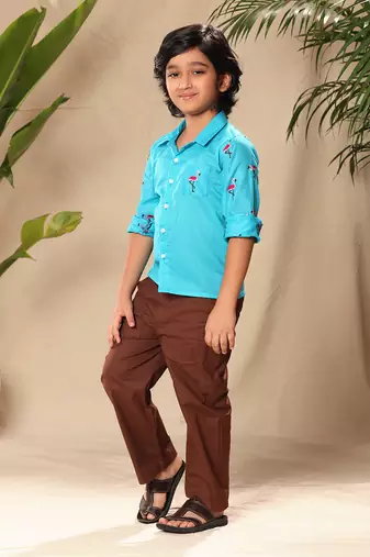 Blue embroidered raglan sleeve collar shirt with black trousers