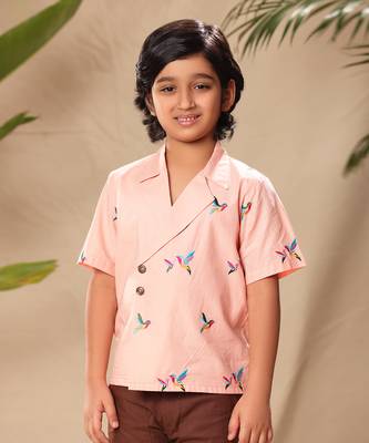 Pink embroidered blazer style shirt with brown trousers 4
