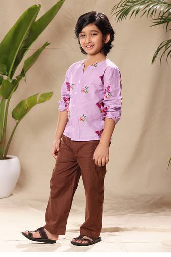 Lavender embroidered no collar shirt with brown trousers