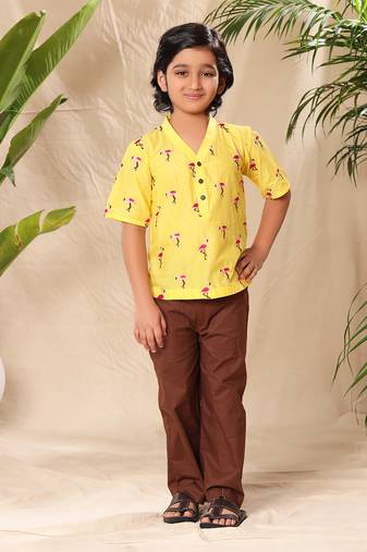 Yellow embroidered no collar short kurta with brown trousers