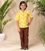 Yellow embroidered no collar short kurta with brown trousers