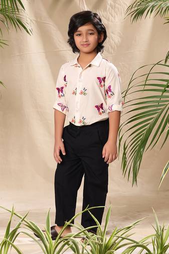 Off white embroidered classic shirt with black trousers
