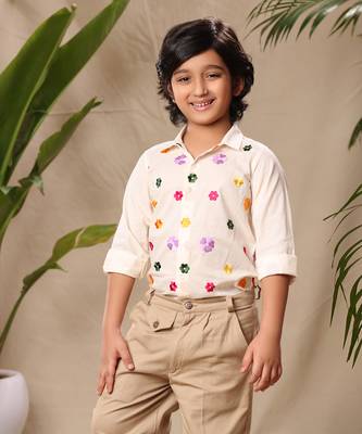 Off white embroidered classic shirt with beige trousers 3