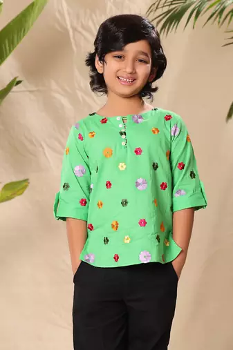 Green embroidered kurta shirt with black trousers
