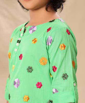 Green embroidered kurta shirt with black trousers 4