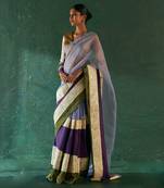 Ivory striped saree with tissue blouse