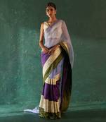Purple saree with sleeveless blouse