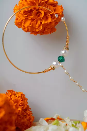 Traditional Gold Nose Ring with White Pearl Chain for Festive and Bridal Elegance