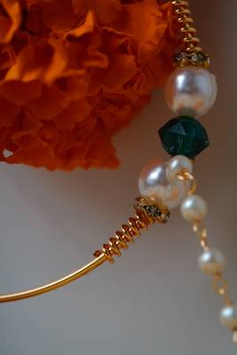 Traditional Gold Nose Ring with White Pearl Chain for Festive and Bridal Elegance 3