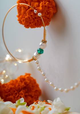 Traditional Gold Nose Ring with White Pearl Chain for Festive and Bridal Elegance 4