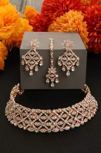 Rose Gold Plated Stone Studded Criscross Pattern Jewellery Set with Earring Maangtika