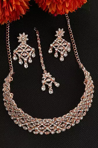 Rose Gold Plated Stone Studded Criscross Pattern Jewellery Set with Earring Maangtika