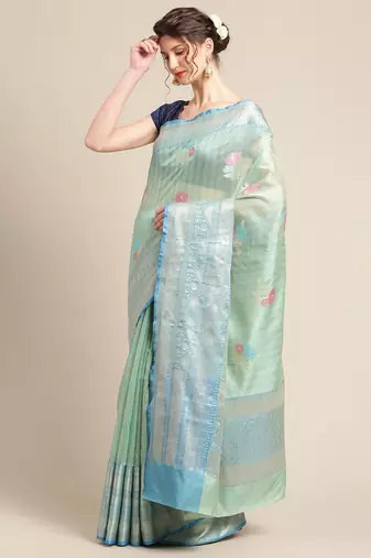 Green woven tissue saree with blouse