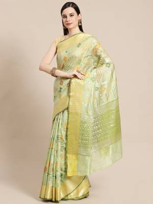 Green woven tissue saree with blouse 1