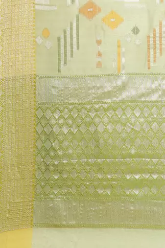 Green woven tissue saree with blouse